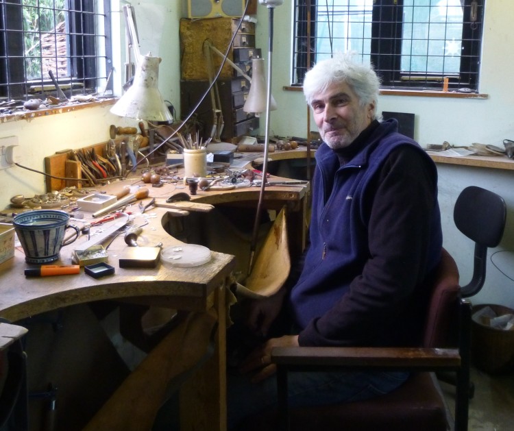 Jeweller Mike Carpenter in his studio at the Spiral Gallery, Debenham