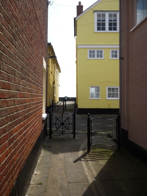 I stood outside the side door to take this - the beach is just over the little wall at the end of Neptune Passage