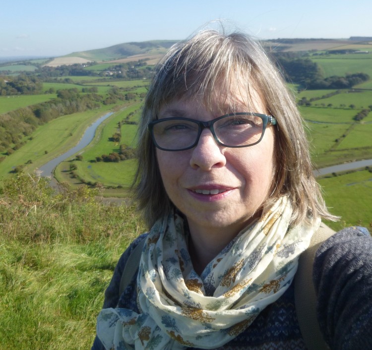 Behind me you can just see the river meanders on the valley floor