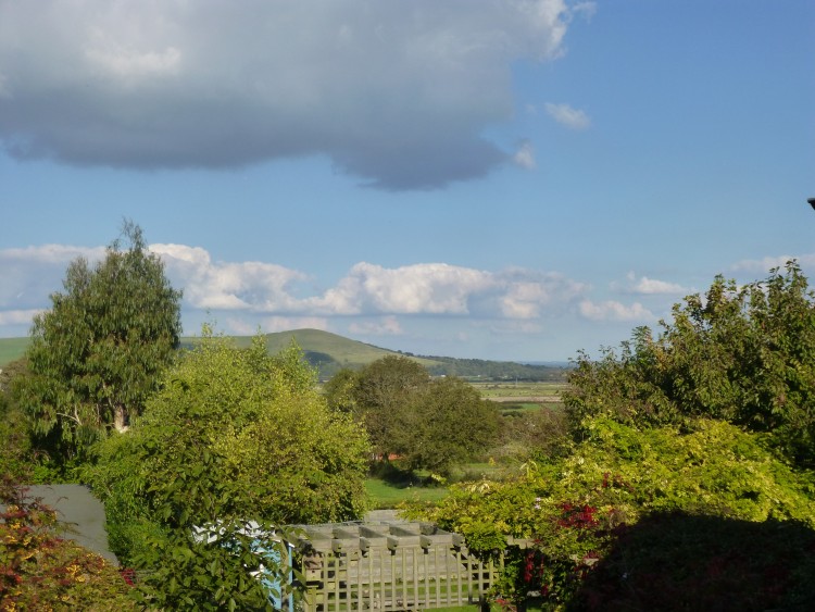 The view from the back of the cottage, with Mount Caburn in the distance, on the other side of the Ouse Valley
