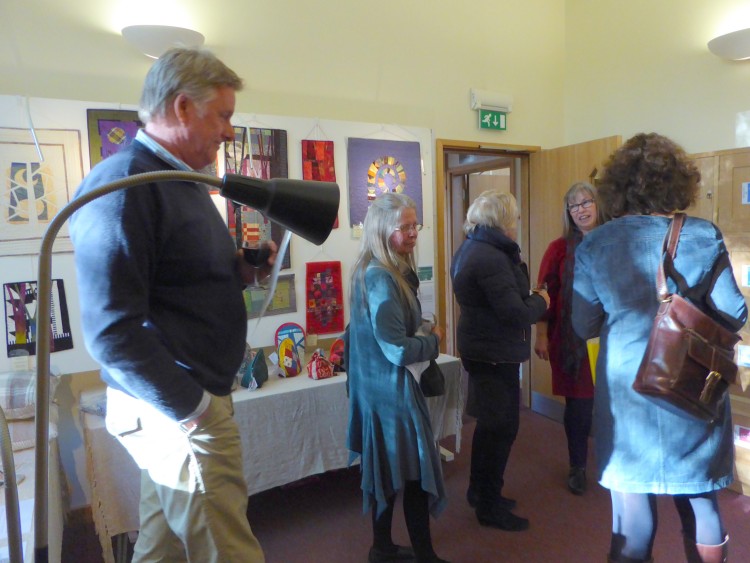 Chatting in the textile room - Helen Howes' work can be seen in the background.